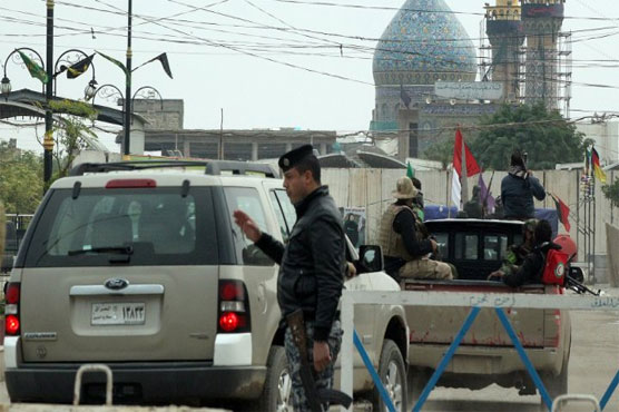 30 killed at Iraqi shrine, days after Baghdad blast