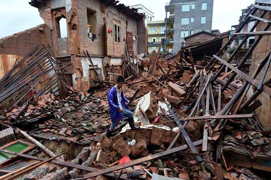 Tropical storm kills six in China, eight missing