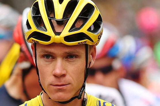 Cycling: Running man Froome keeps yellow jersey despite bike drama