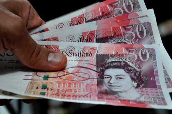 Pound gains as Bank of England holds off rate cut