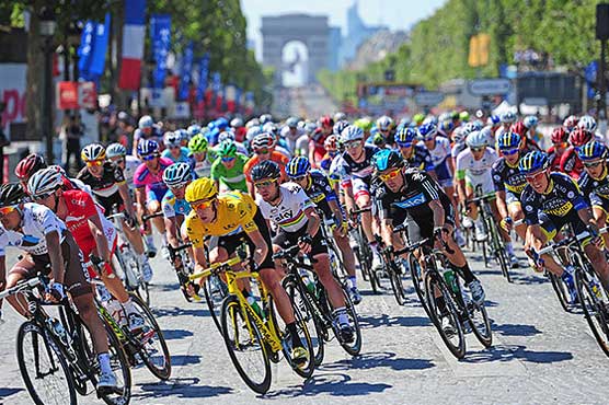 Tour de France returns to racing after day of mourning