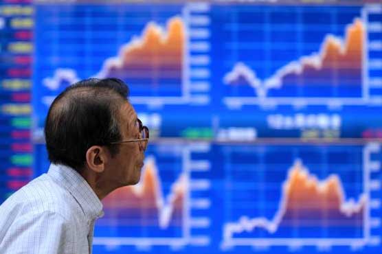 Asian markets drift as dealers await bank meetings