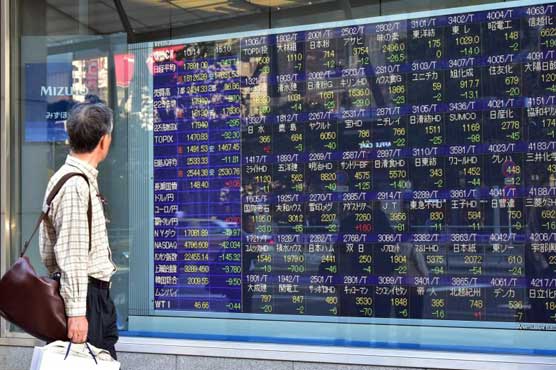 Asia markets move cautiously ahead of bank meetings