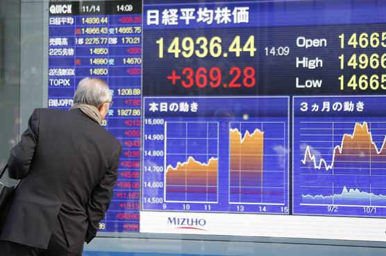 Tokyo shares open lower as stronger Yen hits exporters