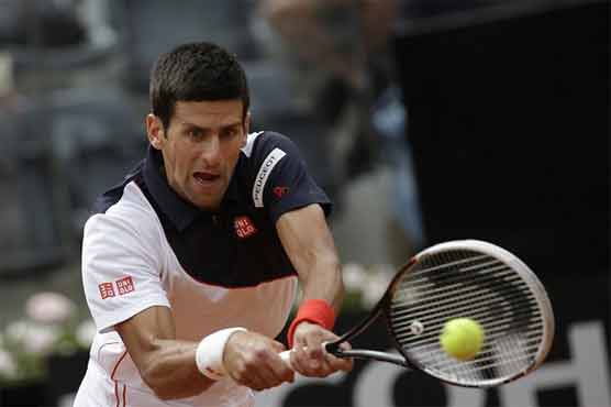 Tennis: Djokovic advances over showman Stepanek