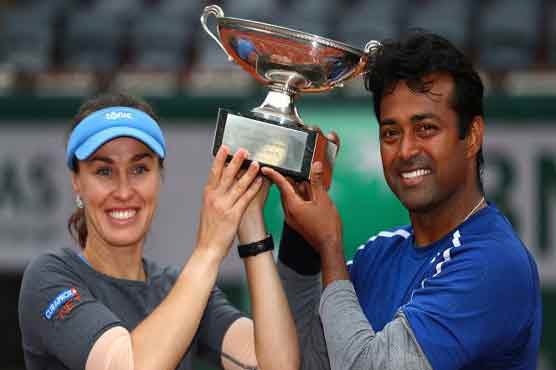 Tennis: Paes, Hingis complete mixed doubles Slam