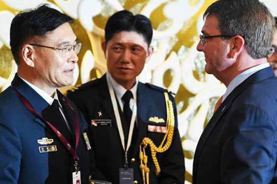 China hits at US 'provocations', says doesn't fear 'trouble'