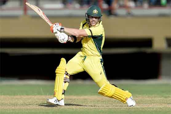 Warner hits half century as Australia thrash Windies