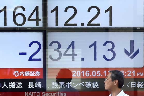 Tokyo stocks fall by break as strong Yen hits exporters
