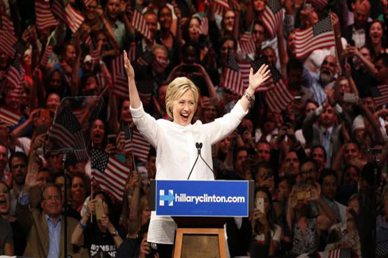Clinton declares victory in Democratic race, hails a milestone