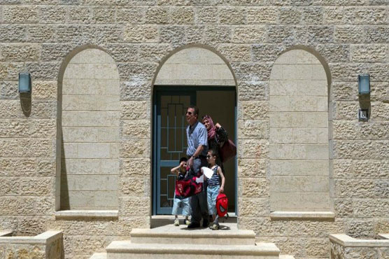 Palestinians move into new city, part of statehood dream