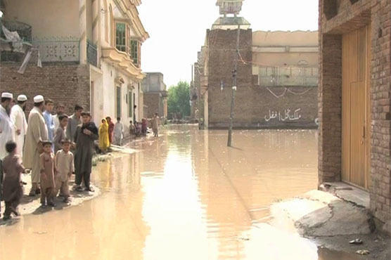 Houses crammed with filthy water after breach in Peshwar's nullah