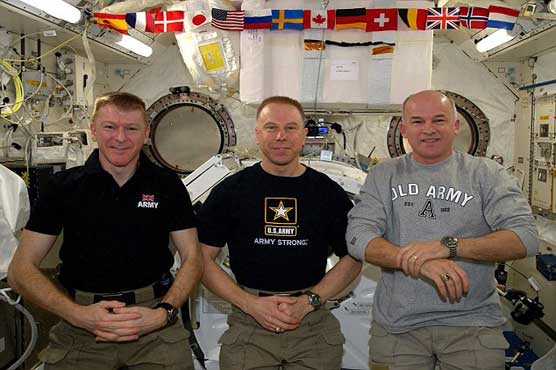 Three astronauts touch down after 6 months in space
