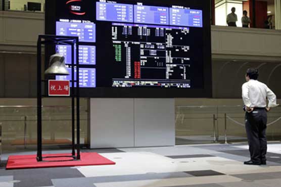 Tokyo shares open lower as strong Yen dents exporters