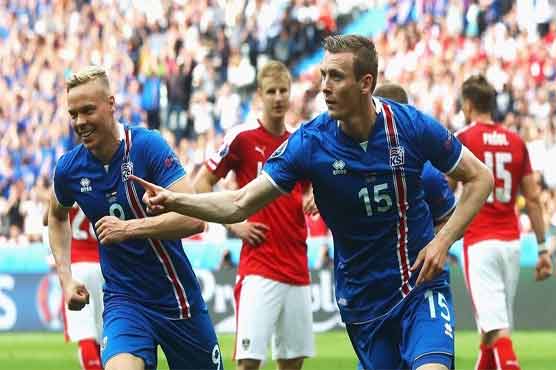 Football: Iceland beat Austria 2-1 to go into last 16