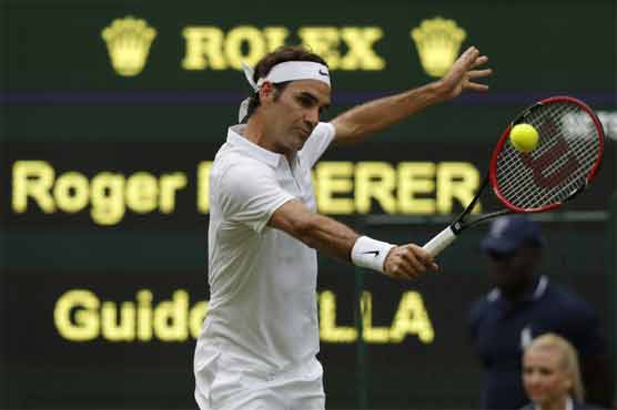 Tennis: Below-par Federer into Wimbledon second round