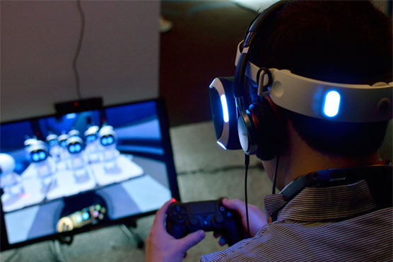 Sony upbeat on games and robots but cuts outlook for image sensors