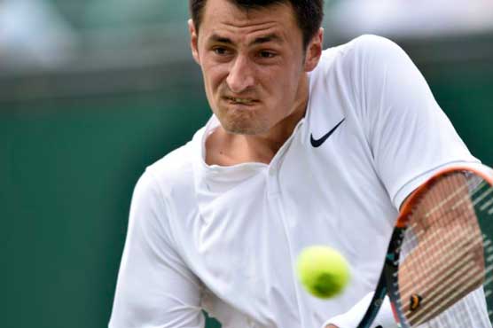 Tomic told to apologise for 'retard' comment