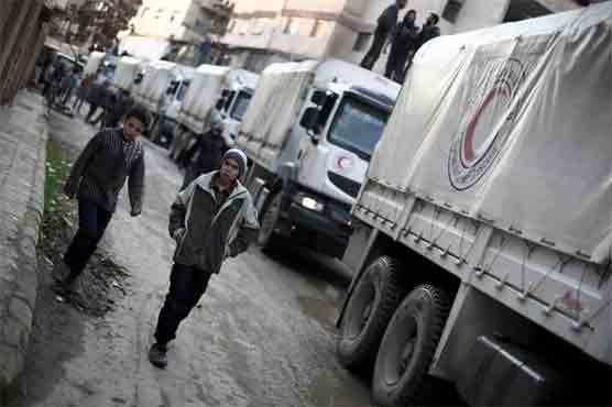 Syria truce task force meets as aid deliveries start