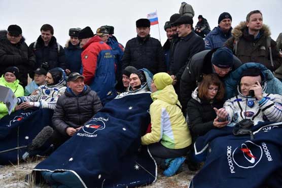 International Space Stations' 'one year crew' returns to Earth