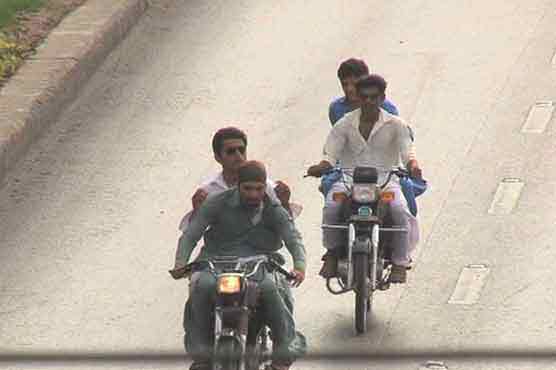 Pillion riding ban lifted in Karachi