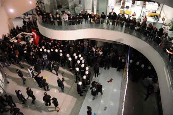 Turkey seizes control of anti-Erdogan daily in midnight raid