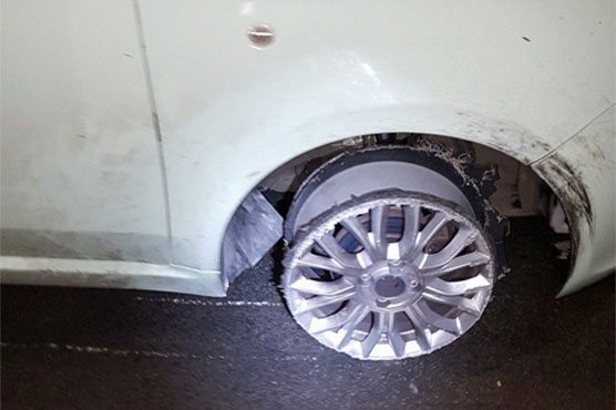 Chief catches woman driving on three tires, with sparks flying