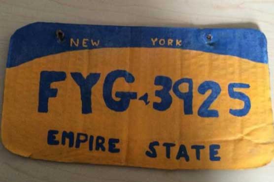 Homemade, cardboard license plate lands NY woman in jail