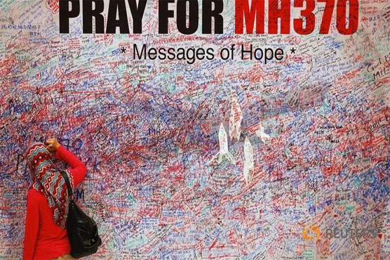 Among the believers: hope endures for MH370 relatives