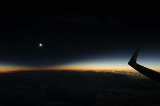 Skygazers catch flight for prime view of total solar eclipse