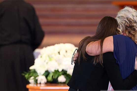 Tributes flow at emotional Crowe funeral