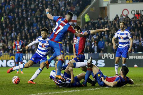 Football: Palace pounce late to reach FA Cup semi-finals