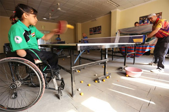 Wounded in bombing, Iraq girl now rising table tennis star