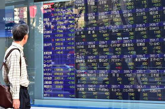 Tokyo stocks dip by break ahead of Bank of Japan decision