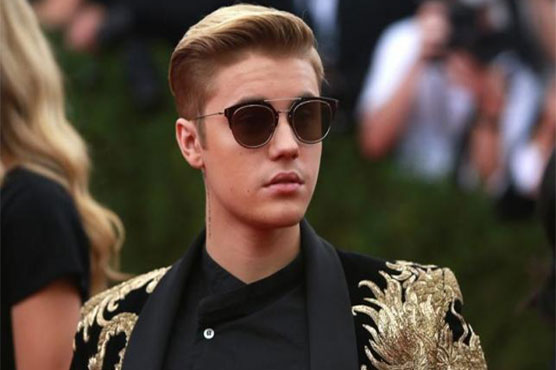 Justin Bieber settles photographer assault lawsuit