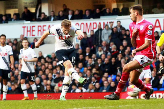 Football: Lethal Kane keeps Spurs in title hunt
