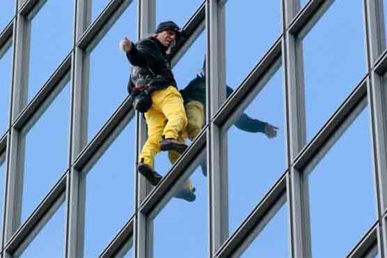 French 'Spiderman' scales Paris skyscraper