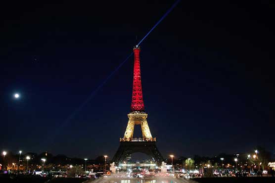 Eiffel Tower lit up in Belgian flag colours in show of solidarity