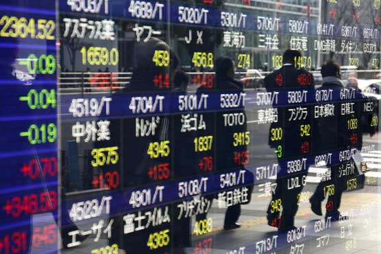 Tokyo shares open lower on weaker oil prices