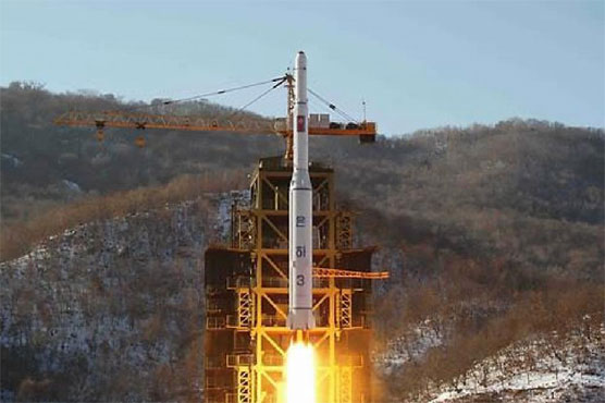 N. Korean leader claims solid-fuel rocket success