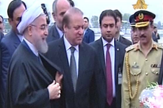Iranian President welcomed by Nawaz Sharif at Noor Khan Airbase