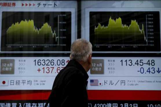 Most Asia markets fall but Tokyo rallies with Dollar