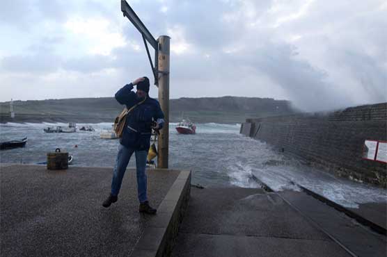 Powerful winds bring outages, traffic chaos to France, UK