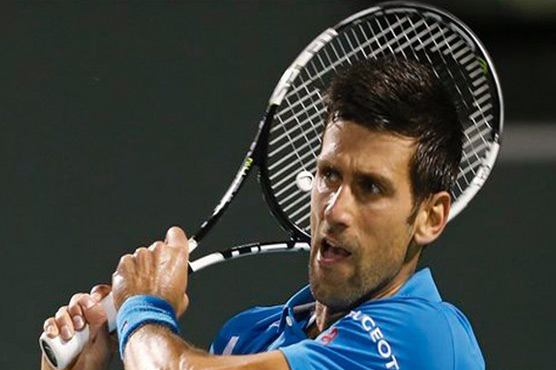 Djokovic withstands back spasms to reach semis