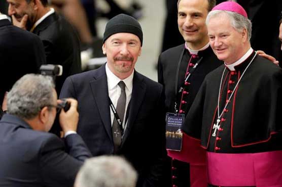 U2 guitarist The Edge makes history as he rocks Sistine Chapel for cancer