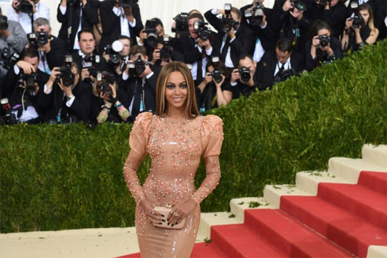 Stars at Met Gala go bold with glam-tech looks 
