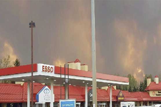 Canada oil output slashed due to Alberta wildfire