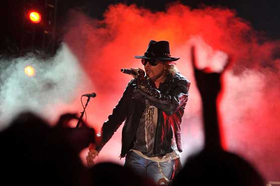 Rock of ages: Axl Rose makes AC/DC debut with open-air Lisbon gig