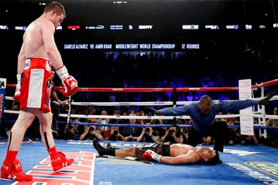 Boxing: Alvarez knockouts Khan to retain WBC middleweight title