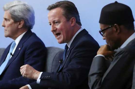 UK hails progress, defends tax havens at corruption summit